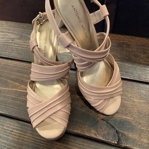 Woman’s cream strap heels